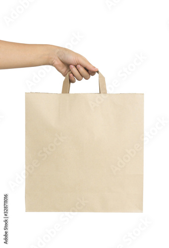 Hand holding paper bag