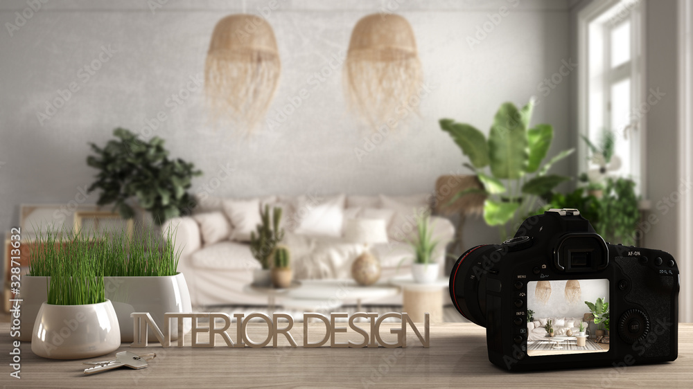 Architect photographer designer desktop concept, camera on wooden work desk with screen showing interior design project, blurred scene in the background, old style living room idea