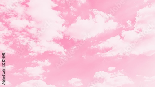 Pink sky background with soft delicate white clouds. Copy space. Romantic 16:9 panoramic background © kvitkanastroyu