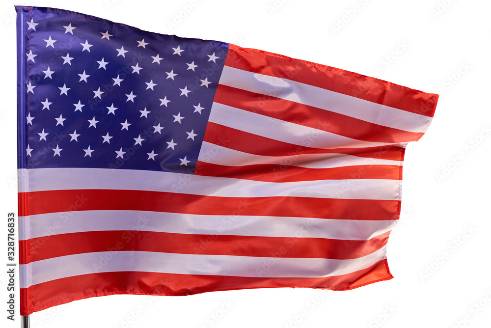 Fototapeta premium American flag flying in the wind, isolated on a white background.
