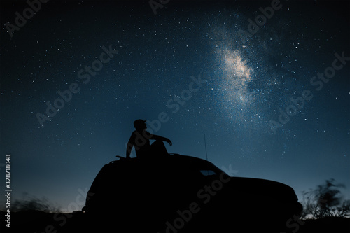 car on the background of the night sky in the desert