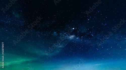 Milky way galaxy with stars and space in the universe background at thailand