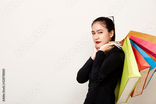 happy woman shopper with shopping bag