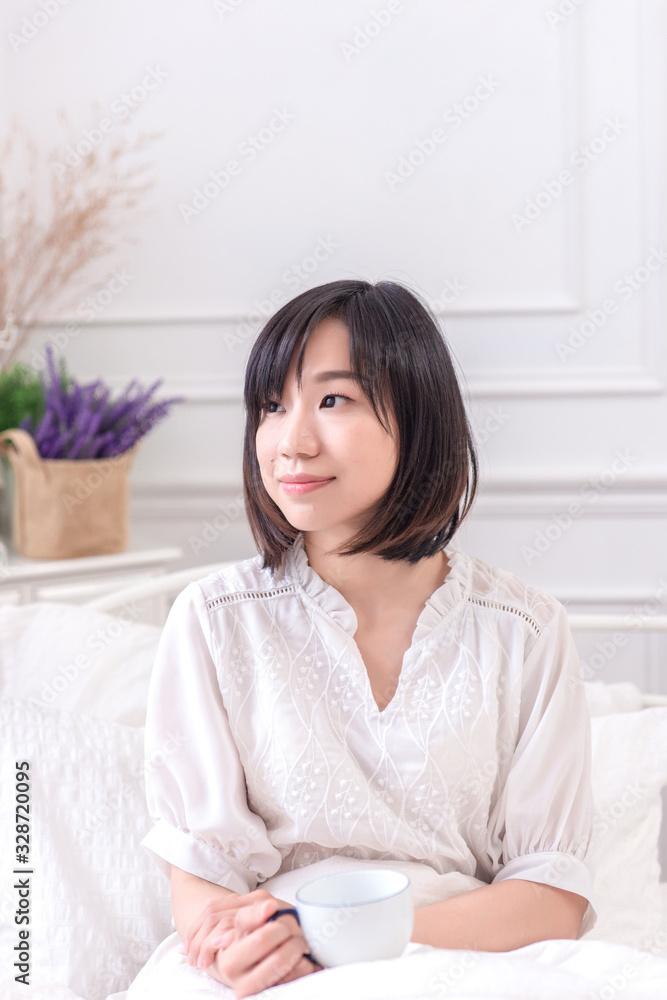 Portrait of beautiful asian young woman sleep lying in bed with head on pillow comfortable and happy with leisure, girl with relax for health and lifestyle concept.