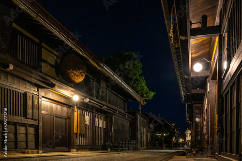 Night view of Sannomachi Street in Takayama, with old wooden buildings and houses dating from the Edo Period, Japan
