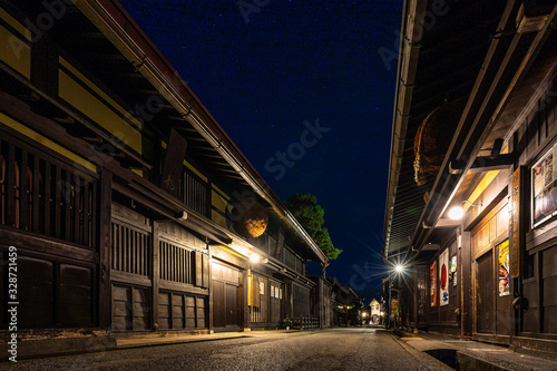 Night view of Sannomachi Street in Takayama, with old wooden buildings and houses dating from the Edo Period, Japan