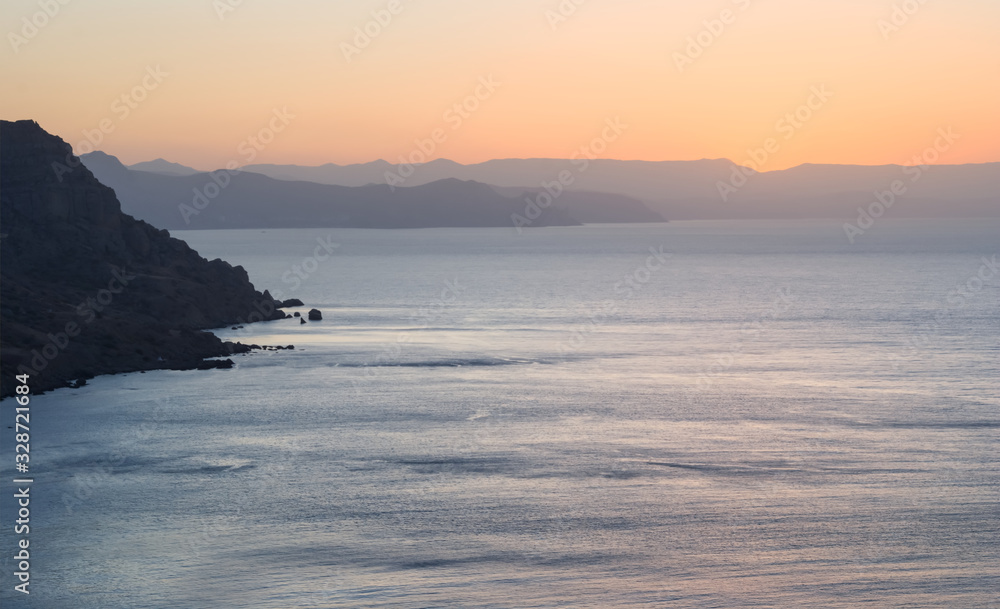 sea cliff silhouette at the early morning, sea sunrise scene