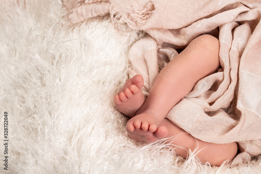 Closeup of newborn baby feet. place under the text. concept of happiness Closeup of newborn baby feet. place under the text. concept of happiness