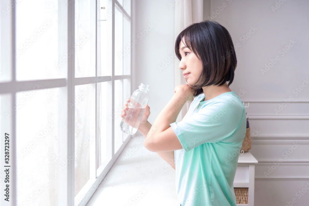 Beautiful Asian girl, Fit sportswoman exercising and training at home Beautiful Asian girl, Fit sportswoman exercising and training at home