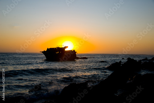 sunset behind shipwreck of japanese trawler meisho maru no 38 near cape agulhas