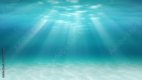 underwater background with rays of light - loop photo