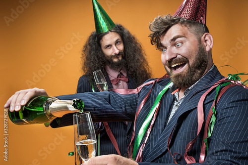 Two funny guys celebarting a success photo