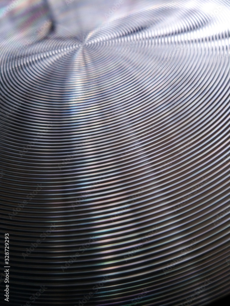 Bottom of metal frying pan, kitchen utensil detail background. Bottom of metal frying pan, kitchen utensil detail background.