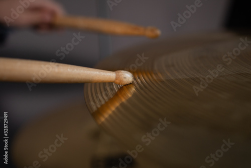 closeup of drum sticks, the baton hits the drum drum closeup macro