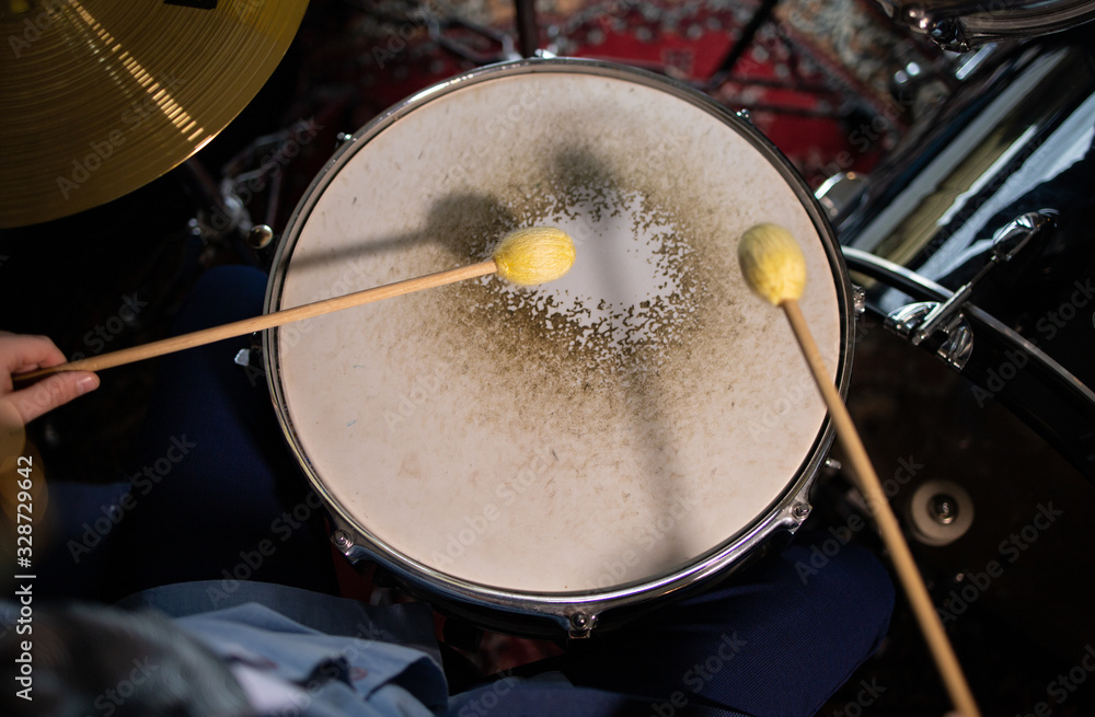 chopsticks above the drum shot from above chopsticks above the drum shot from above