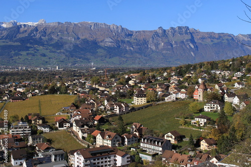 Aerial view of Vaduz, the capital city of Liechtenstein in Europe, taken from Vaduz Castle trail. photo