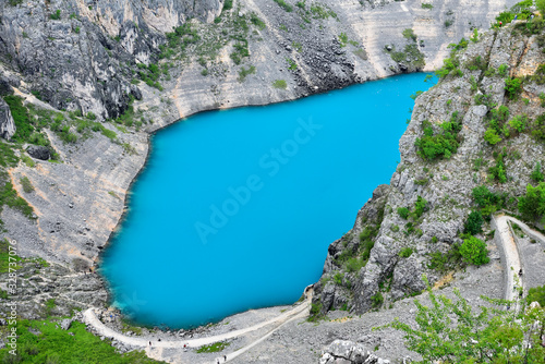 Blue lake (Modro Jezero) in the crater of an extinct volcano in Croatia.