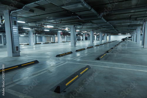 Horizontal image of empty underground parking lot