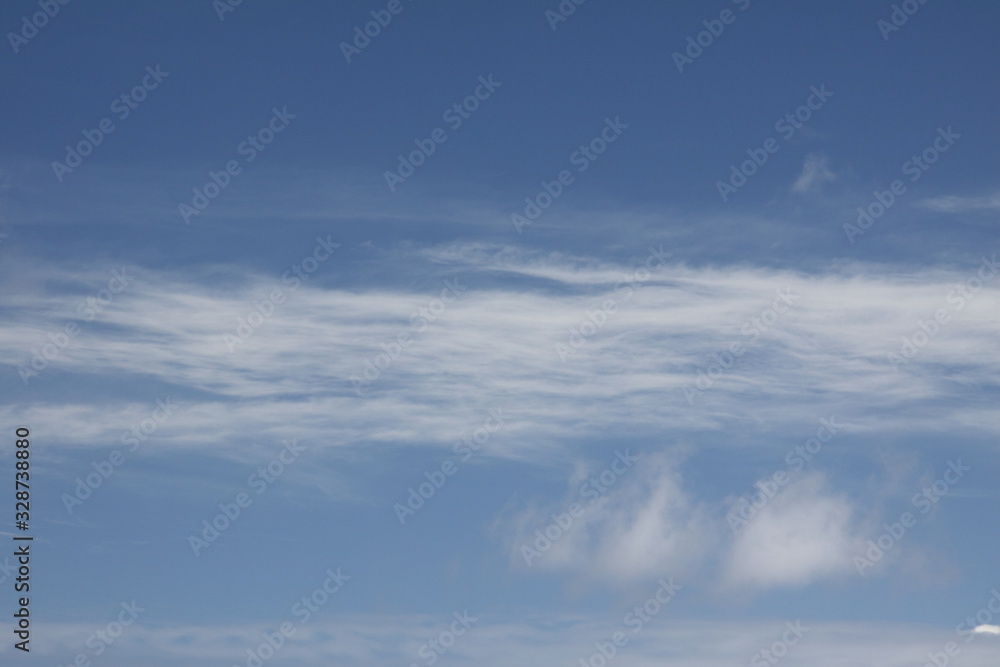 Wispy Clouds In A Blue Sky