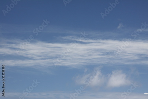 Fototapeta Naklejka Na Ścianę i Meble -  Wispy Clouds In A Blue Sky