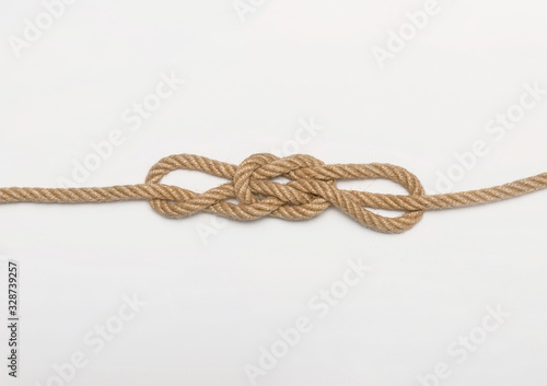 Tomeol knot bend knot. Isolated image of tangled ropes on white background.