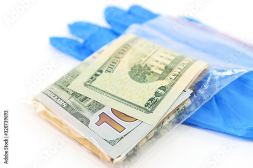 Plastic bag with money and medical gloves