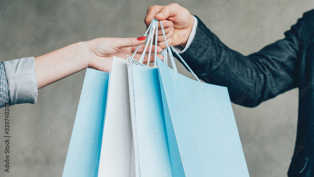 Personal shopping assistant. VIP client service. Classy woman receiving mockup brand bags.