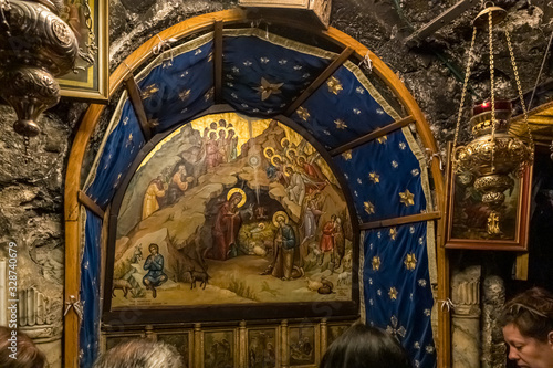 Fototapeta The interior of the Christmas Cave in the Church of Nativity in Bethlehem in Pal