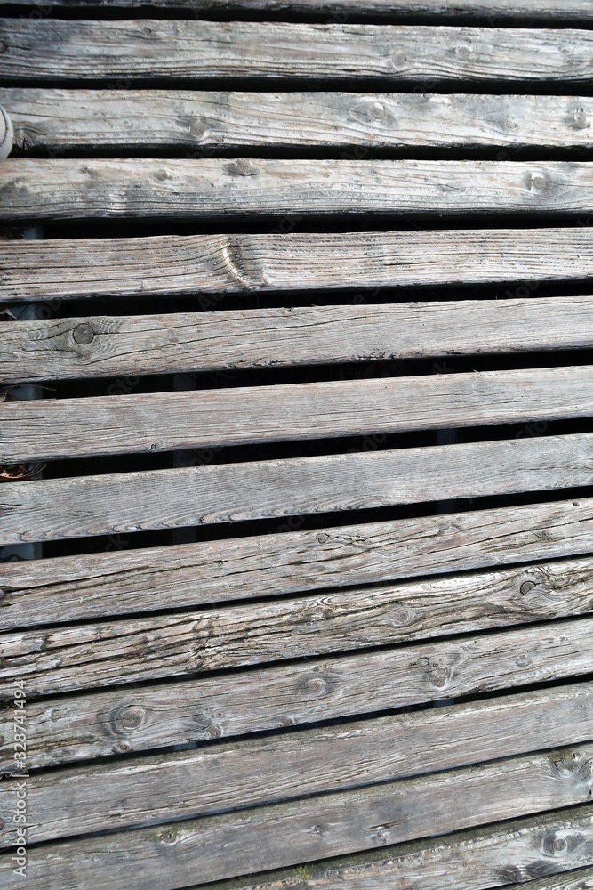 Eine Wand aus verwittertem Holz Eine Wand aus verwittertem Holz