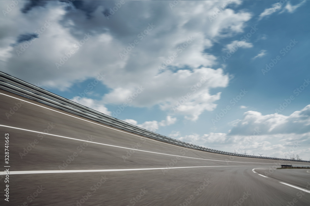 Race Car / motorcycle racetrack on a sunny day.
