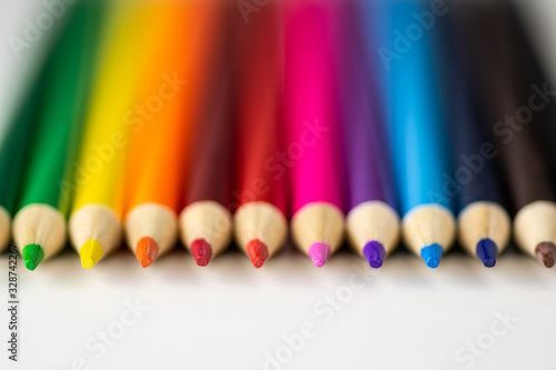 Close-up Photo of a Row of Colored Penciles