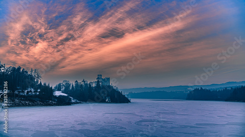Beautiful sunset over Niedzica castle, Poland in winter © shaiith