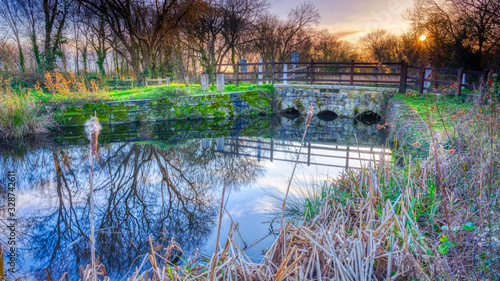 Winter sun on the Bridge at the Sea Lock on the Titchfield Sea Canal, Hampshire, UK photo