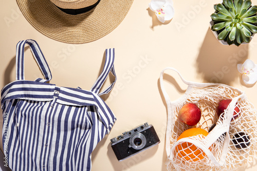 Flatlay set on yellow backdrop. Summer background. Flat lay, top view summert...