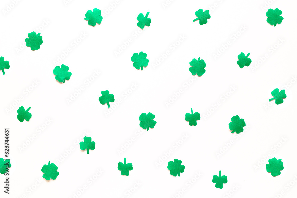 St.Patrick 's Day. Clover leaf background for design on white. St.Patrick 's Day. Clover leaf background for design on white.