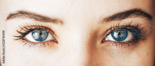 beautiful blue eyes with long eyelashes lenses vision