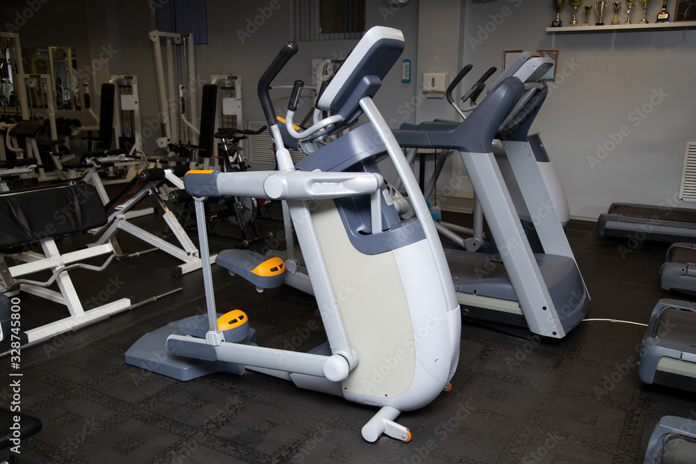 Gym equipment and dumbbells for fitness classes in the gym.