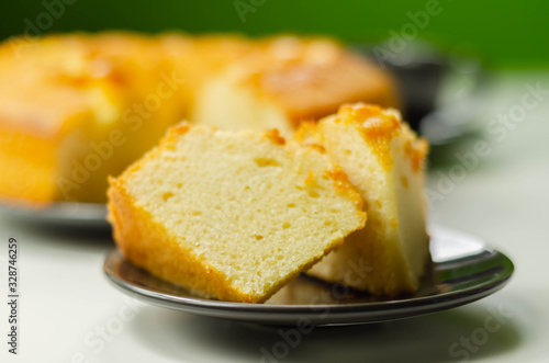 Portion of Madeira ring loaf cake served on a small plate