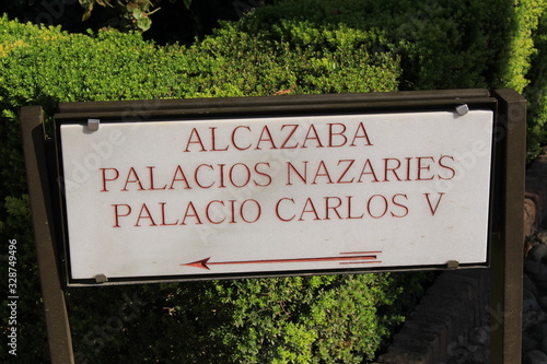 An arrow mark carved on marble which directs tourists to the famous 