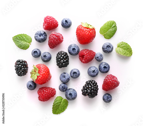 Fresh summer berries on white background. Top view