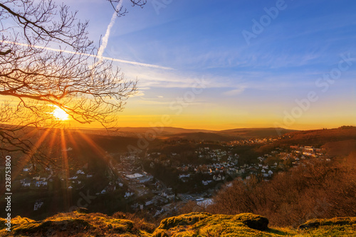 beautiful view of win village in a valley in the middle of the forest, greenery and a great sunset photo