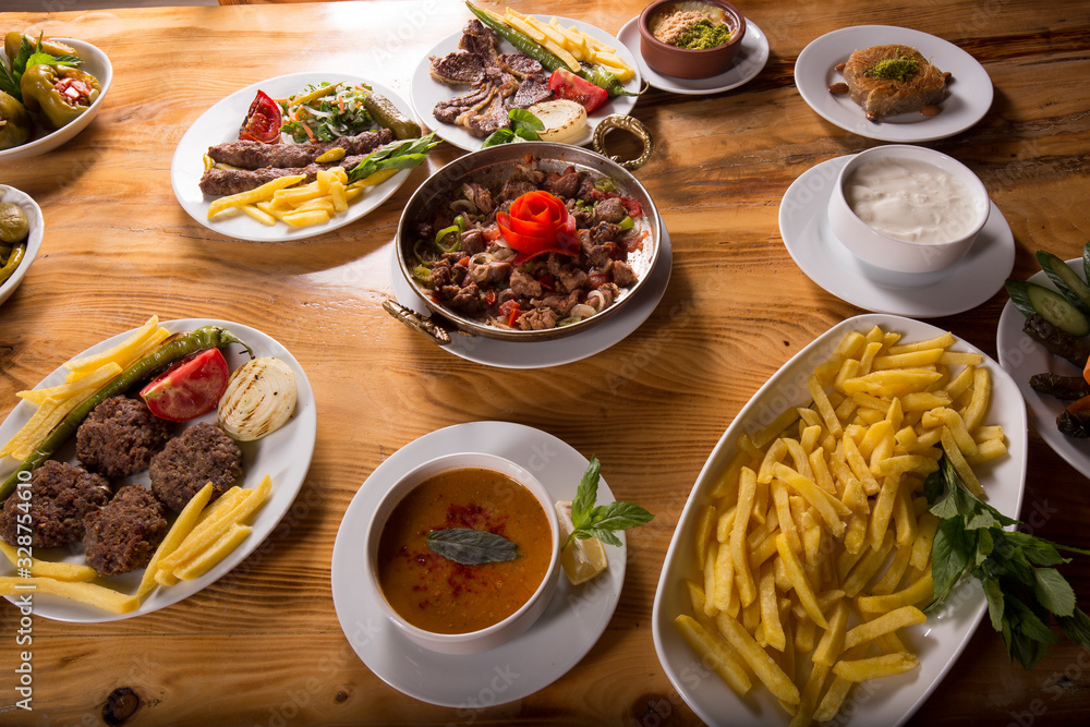 assorted turkish kebabs on wooden table assorted turkish kebabs on wooden table