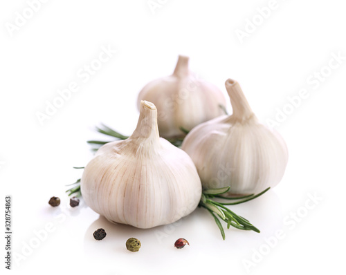 Garlic and rosemary isolated on white background