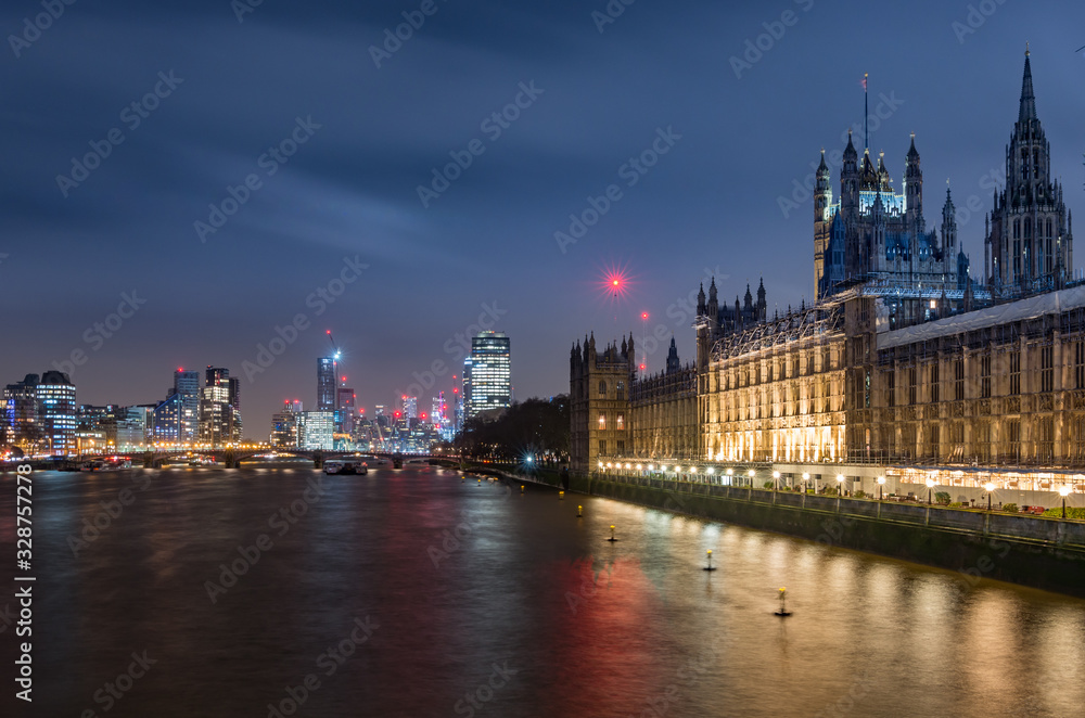 London in the night, Houses of Parliament (Palace of Westminster) and modern Vauxhall district over river Thames