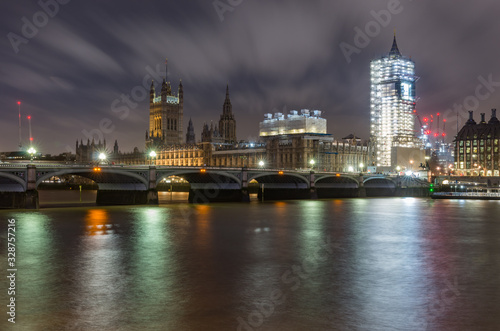 London in the night  Houses of Parliament over river Thames  Big Ben under renovation