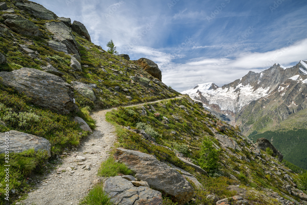 Amazing hike from Kreuzboden to Saas-Almagell with views on Alps above the Saas-Fee village in Switzerland