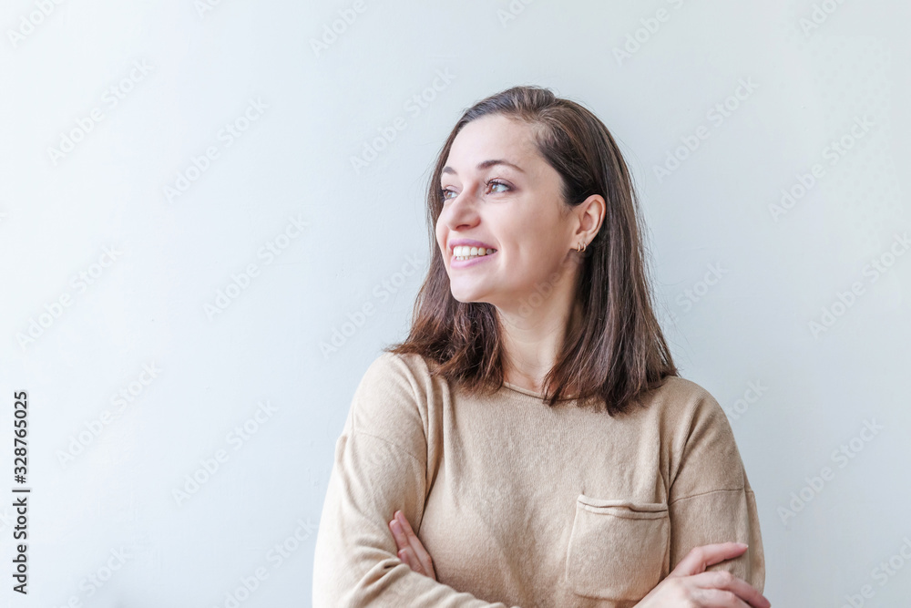 Happy girl smiling. Beauty portrait young happy positive laughing brunette woman on white background isolated. European woman. Positive human emotion facial expression body language. Happy girl smiling. Beauty portrait young happy positive laughing brunette woman on white background isolated. European woman. Positive human emotion facial expression body language.