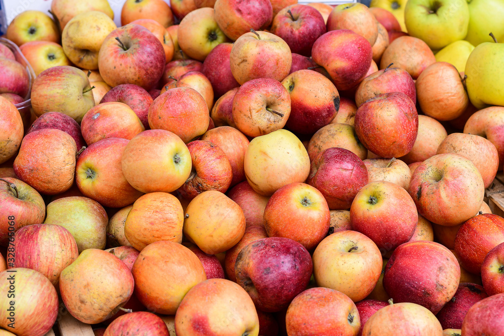 ugly eco food organic apples at the farmers' market. ugly fruits and vegetables concept. selective focus ugly eco food organic apples at the farmers' market. ugly fruits and vegetables concept. selective focus