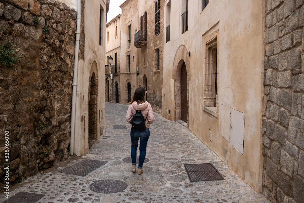 street, architecture, old, building, city, spain, town, europe, ancient, woman, stone, historic, tourism, travel, church, tourist, medieval, arch, walking, house, alley, ibiza, road, people