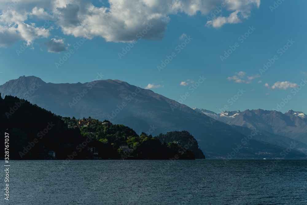View of the lake and mountains. Great view of range above  lake. Dramatic and picturesque scene. Popular tourist attraction. Location place.